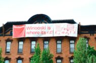 A banner on a building from Waking Windows that says says Winooski is where it's at