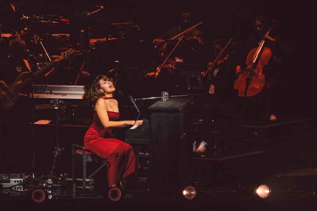 Raye performing at MGM Music Hall